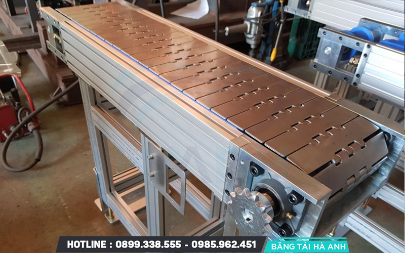 Băng tải xích thép là giải pháp vận chuyển tối ưu cho vật liệu có khối lượng cực lớn