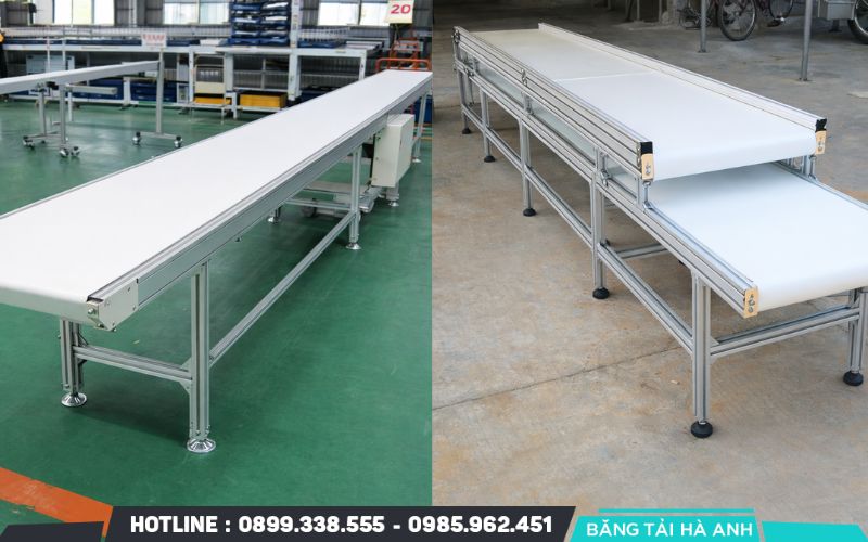 Luồn dây băng tải PU vào hệ thống khung đỡ