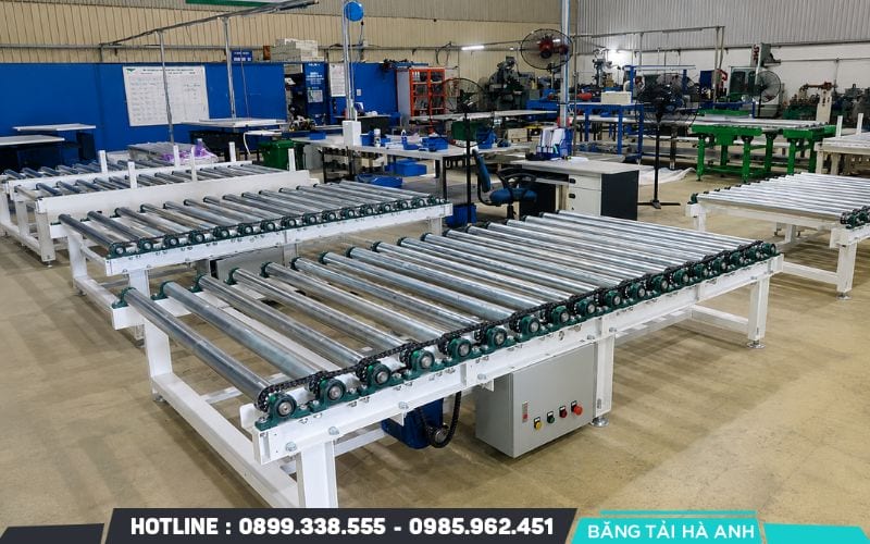 Băng tải con lăn truyền động xích phù hợp với hệ thống cần tải trọng lớn và cường độ vận hành liên tục